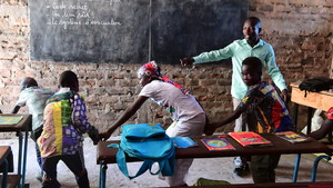 As the practical exercise begins under the direction of the teacher, the pupils follow his instructions to the letter.