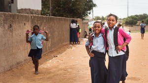 Girls walk to school together in Mozambique.