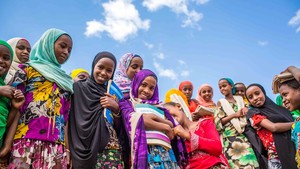 Group of girls holding books