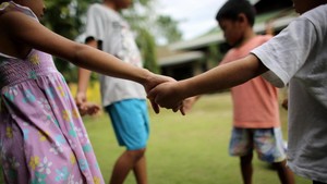 Children holding hands