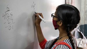 Modern Diplomacy banner, girl at white board