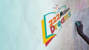 Girl writing on blackboard