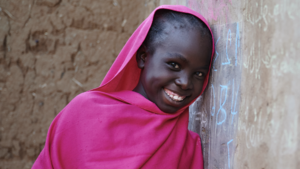 girl leaning on board