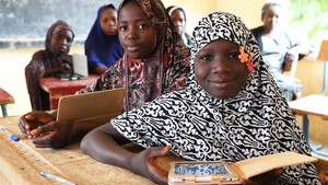 Girls attending class