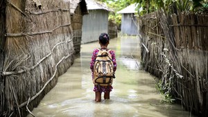 Girl with school bag affected by climate change