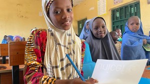 Girls attending class
