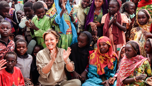 ECW Executive Director Yasmine Sherif with refugee children in Borota, Chad