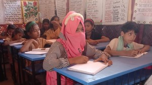 Roshida in class at the UNICEF learning centre.