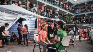 Children at a school used as a shelter in Gaza