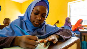 Girl in Nigeria attending class
