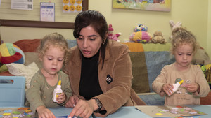 Teacher with students in Ukraine