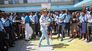 Yasmine Sherif with children at a school in Haiti
