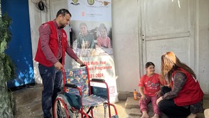 Sara receives a wheelchair to help her get to school