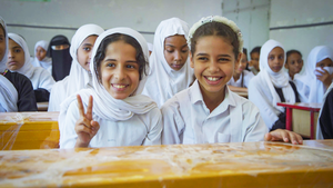 girls smiling during class
