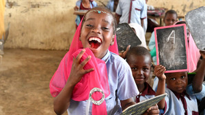 School girl happy in a classroom in Chad