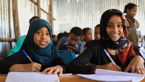 Girls attending class