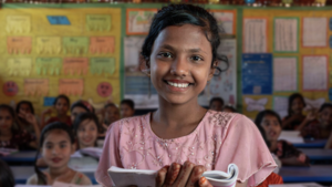 Girl in a classroom in Bangladesh.