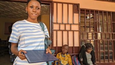 Girl in front of a school in CAR