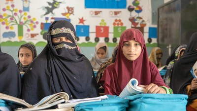 Muqadas, 12, and Salma, 35, at the ALP centre in Dera Ghazi Khan, Punjab, Pakistan