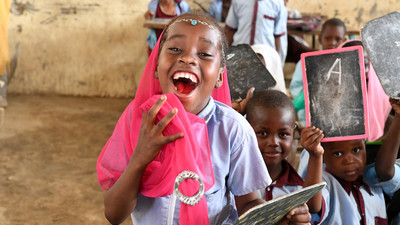 School girl happy in a classroom in Chad