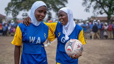 Girls playing football