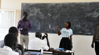 Student Teacher Beatrice practices her sign language in Juba, South Sudan.