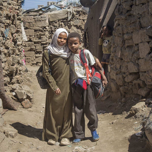 Girl and boy in Yemen going to school.