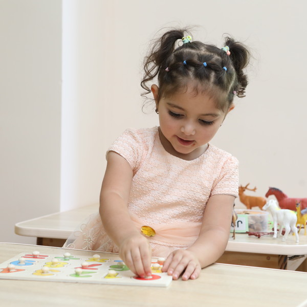 Young girl drawing in Armenia.