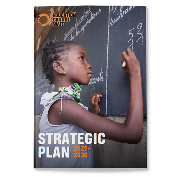 child writing on a dashboard