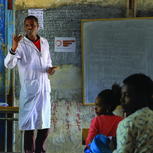 teacher near dashboard