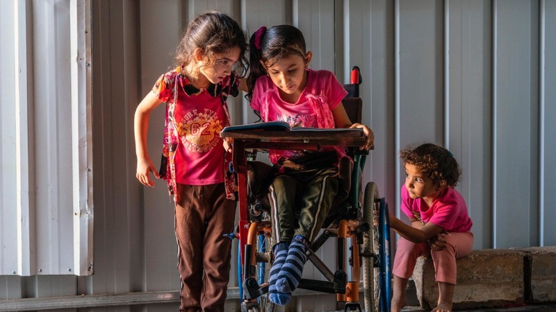 Girls reading a book
