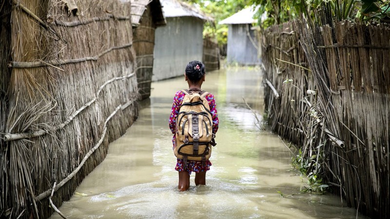Girl with school bag affected by climate change
