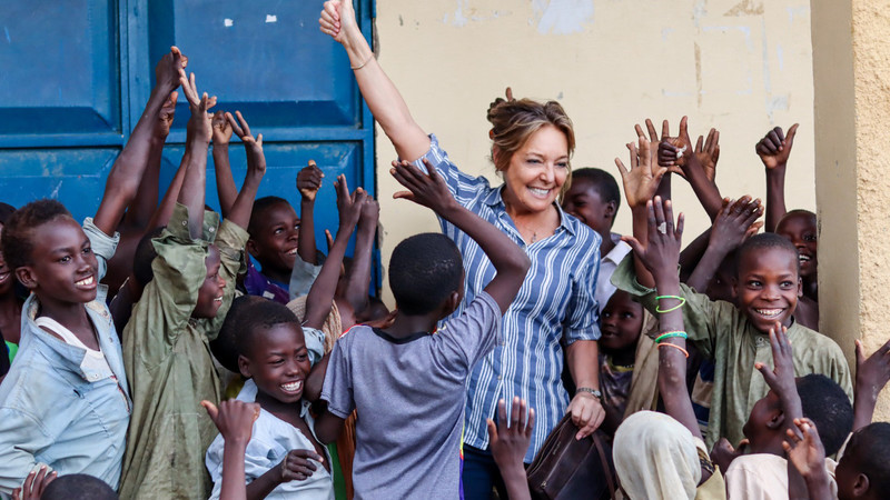 ECW Executive Director with children in Chad