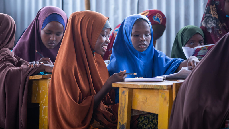 Girls in Somalia studying in class.