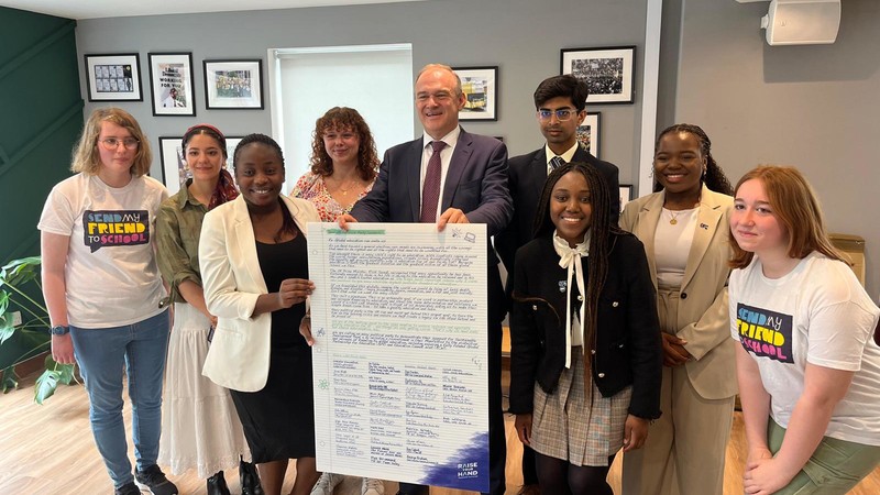 Youth leaders handing out open letter to UK Parliament member