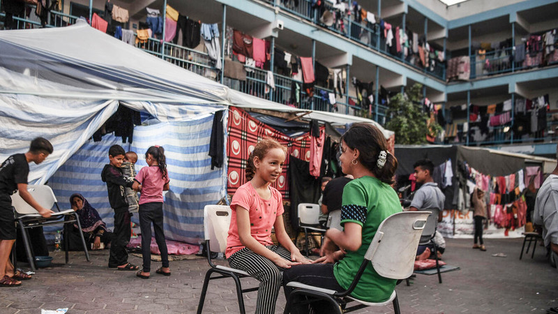 Children at a school used as a shelter in Gaza
