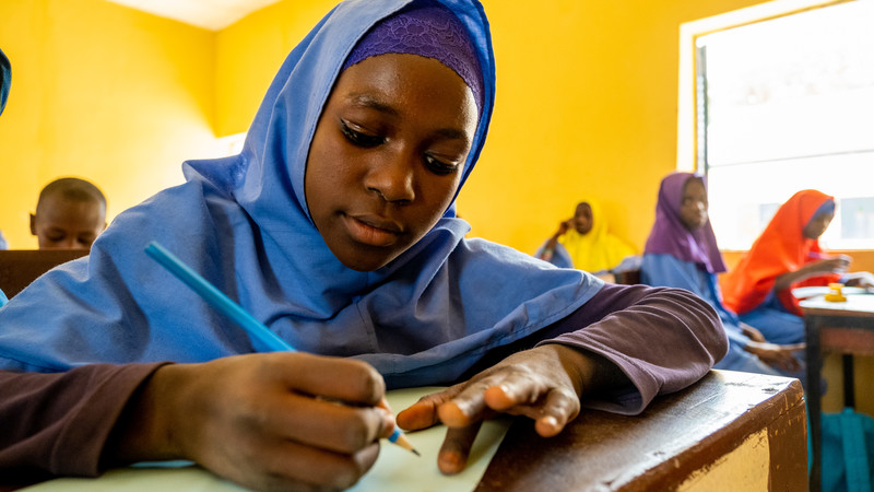 Girl in Nigeria attending class