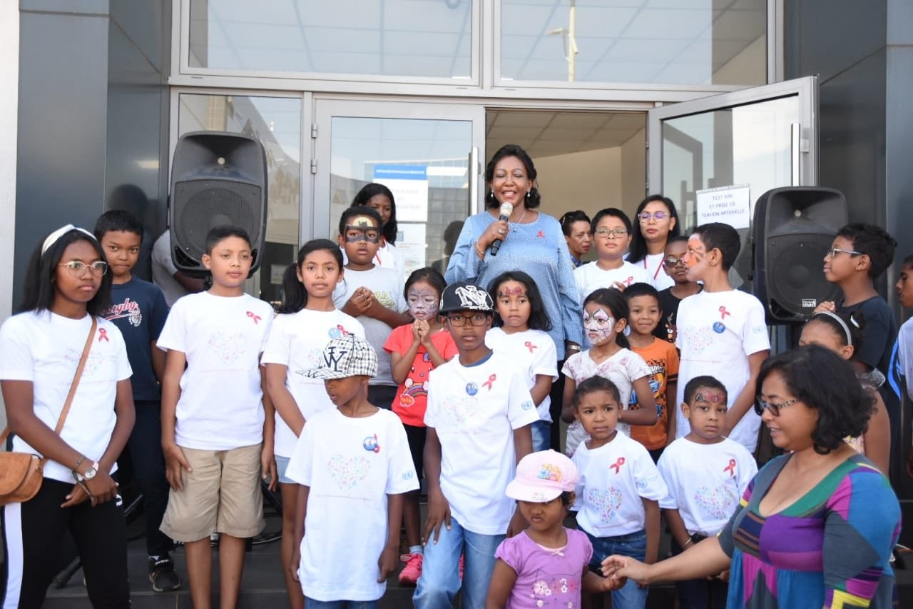 Violeta Kenyana Kakyomya with children.