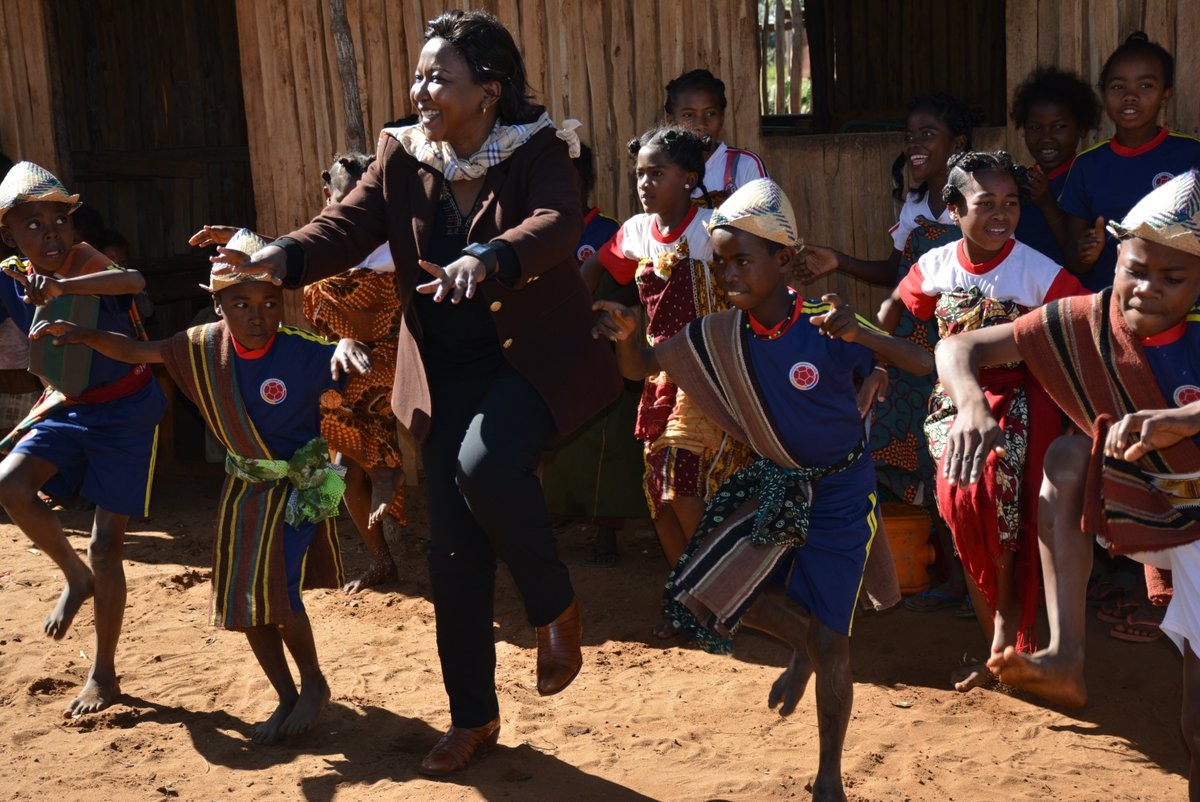 Violeta Kenyana Kakyomya with students.