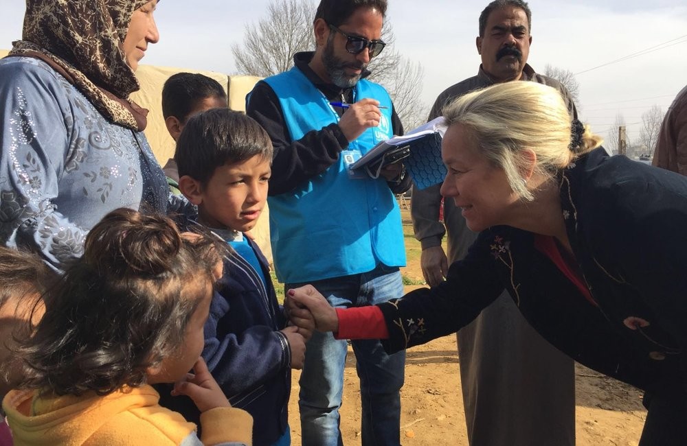 Sigrid Kaag interacting with children