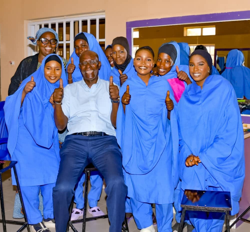 Mohamed M. Malick Fall interacting with children inside a classroom
